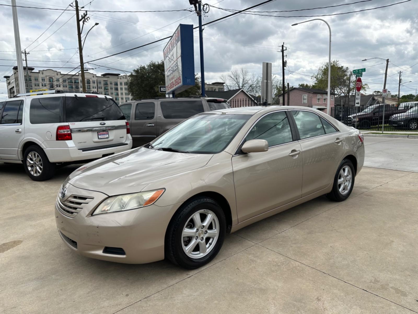 2007 Beige /Beige Toyota Camry LE (4T1BE46K47U) with an 2.4 engine, Automatic transmission, located at 1501 West 15th St., Houston, 77008, (713) 869-2925, 29.797941, -95.411789 - Photo #0
